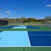 Paving work by Dobbs Tennis Courts, Inc.