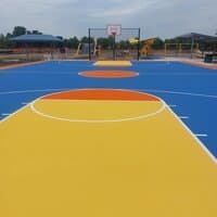Paving work by Dobbs Tennis Courts, Inc.